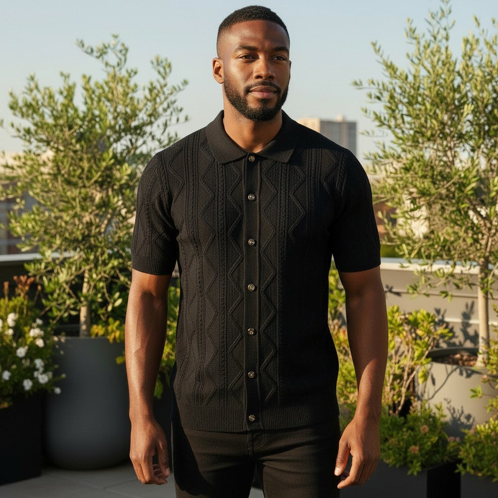 suit-yourself-menswear black knit button down shirt with short sleeves and textured diamond pattern on a rooftop