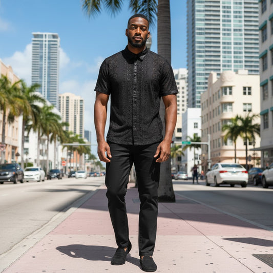 suit-yourself-menswear black lace linen two-piece casual set worn by a man on a sunny city street