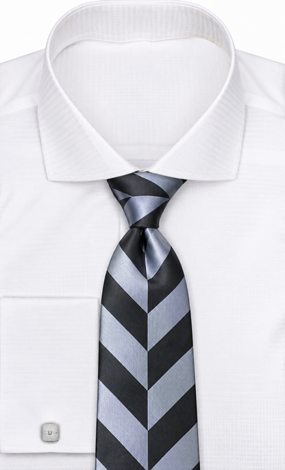 suit-yourself-menswear black and silver chevron necktie tied on a crisp white dress shirt with silver cufflinks