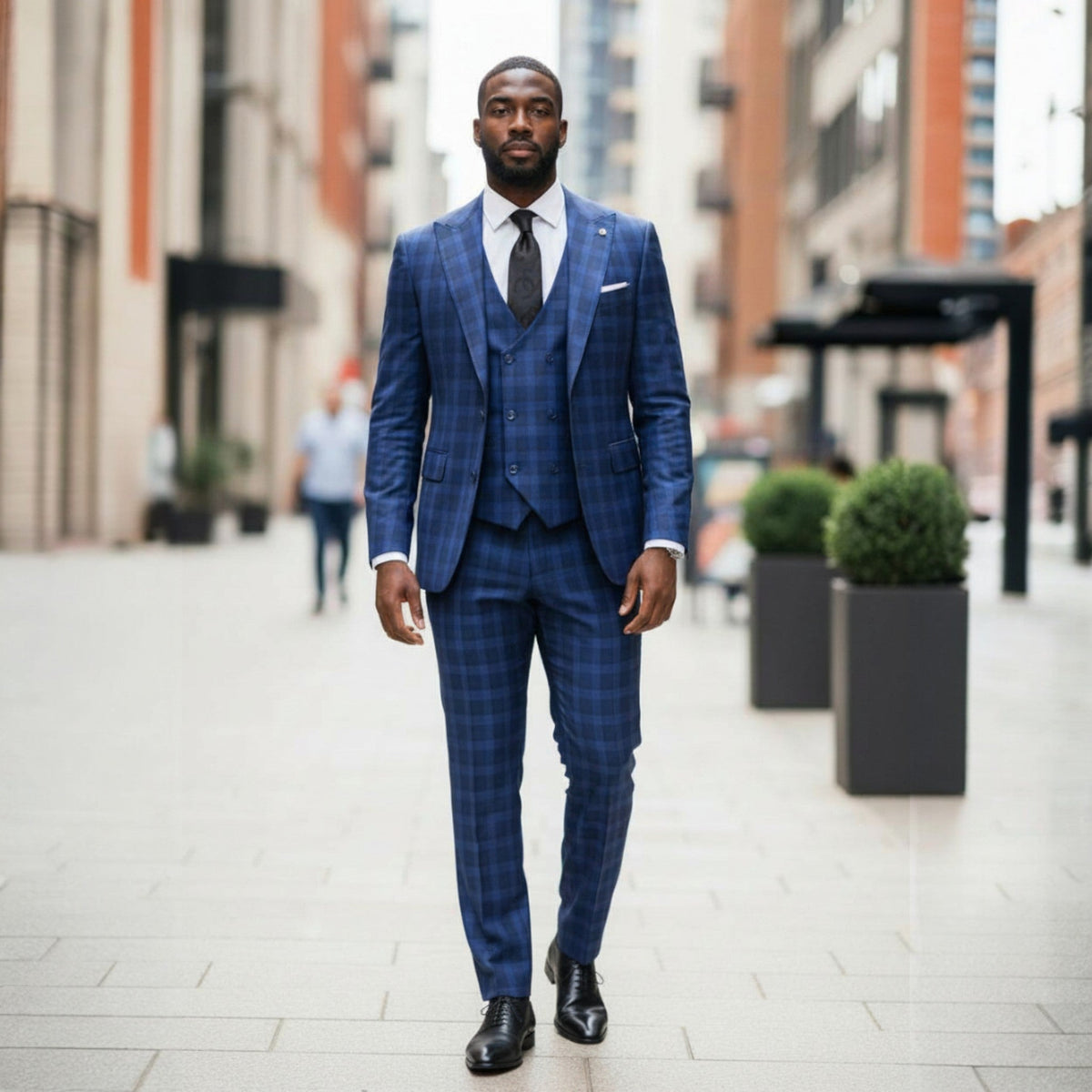 suit-yourself-menswear Tiglio Portofino blue navy plaid 3-piece suit worn by a man walking on a city street