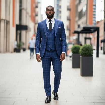 suit-yourself-menswear Tiglio Portofino blue navy plaid 3-piece suit worn by a man walking on a city street