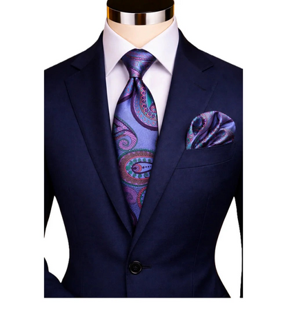 suit-yourself-menswear BRUNO 4 blue and purple paisley necktie with matching pocket square on a navy suit