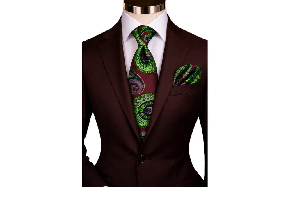 suit-yourself-menswear brown and green paisley necktie with matching pocket square on a dark brown suit jacket