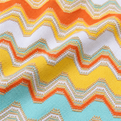 suit-yourself-menswear white and yellow chevron knit sweater fabric detail with orange and turquoise accents