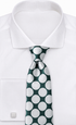 suit-yourself-menswear forest green necktie with large silver polka dots worn with a crisp white dress shirt