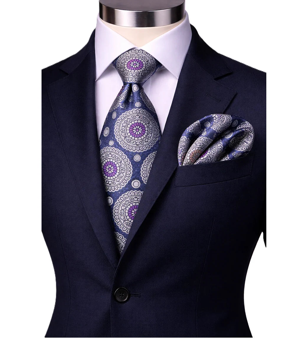 suit-yourself-menswear navy and purple medallion necktie with matching pocket square on a formal suit jacket