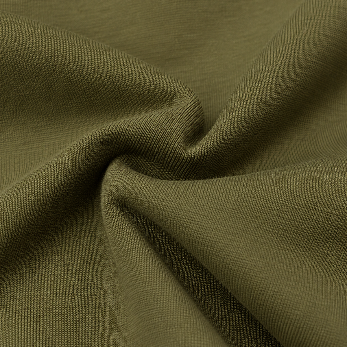 Close-up of olive green fabric texture from a Suit Yourself Menswear two-piece casual set