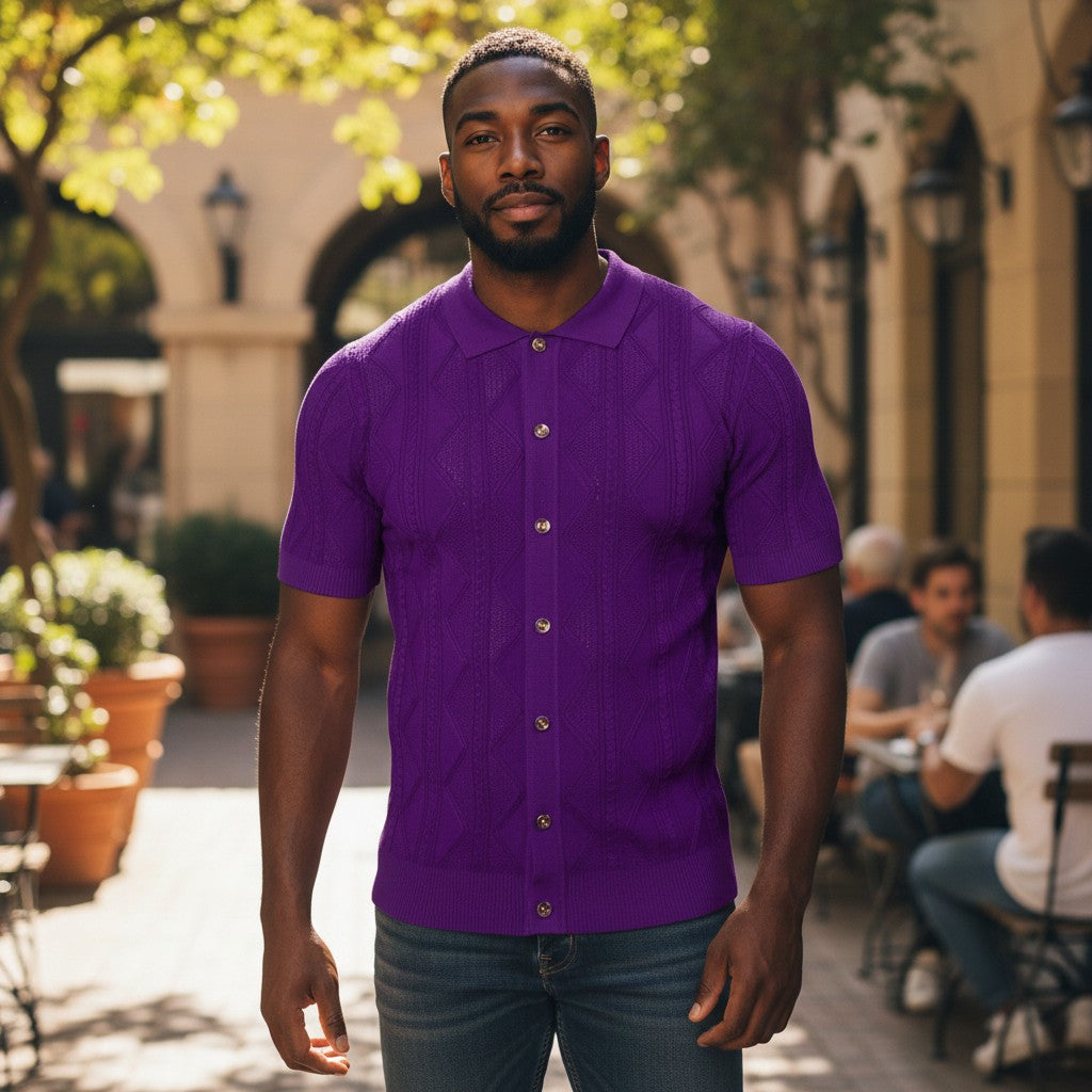 A man wearing a suit-yourself-menswear purple knit button-down short sleeve shirt with a textured diamond pattern.