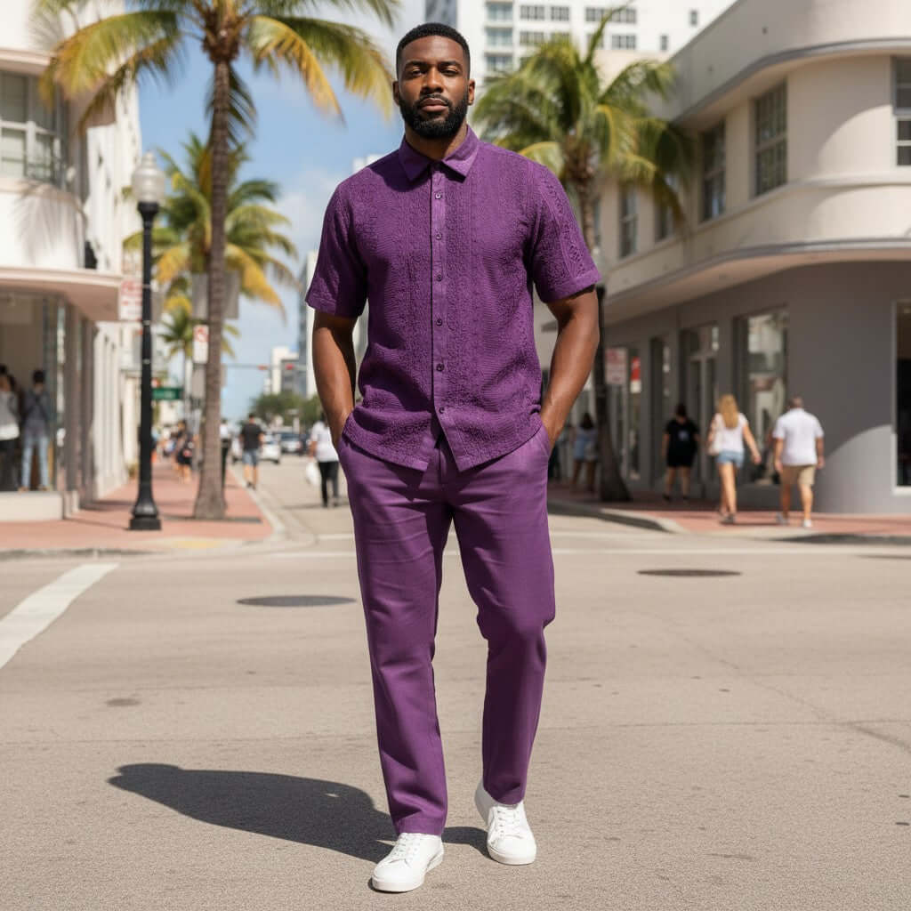 suit-yourself-menswear purple linen two-piece set with lace detailing worn by a man on a sunny city street