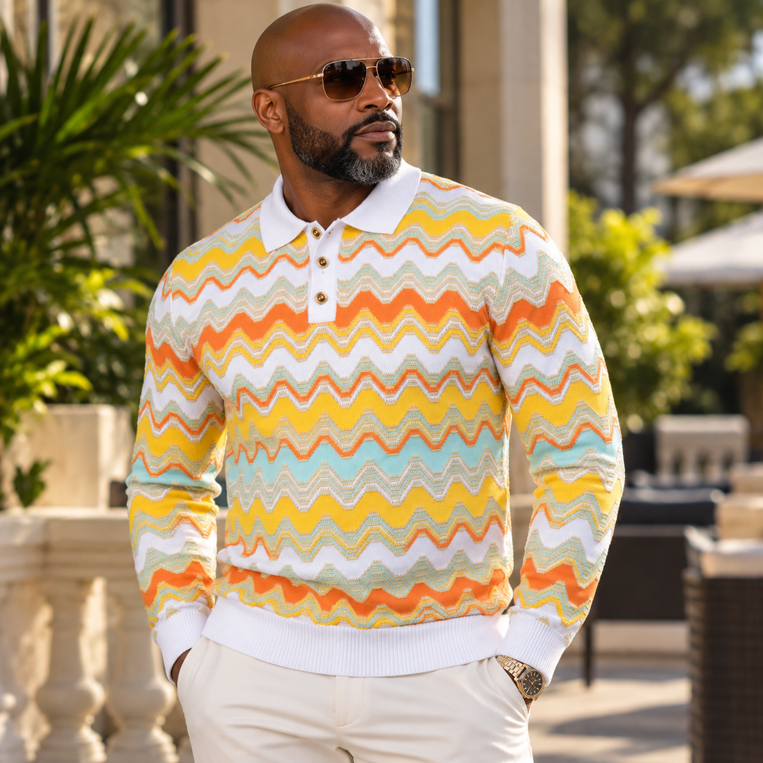 suit-yourself-menswear white and yellow chevron knit polo sweater worn by a man with sunglasses outdoors