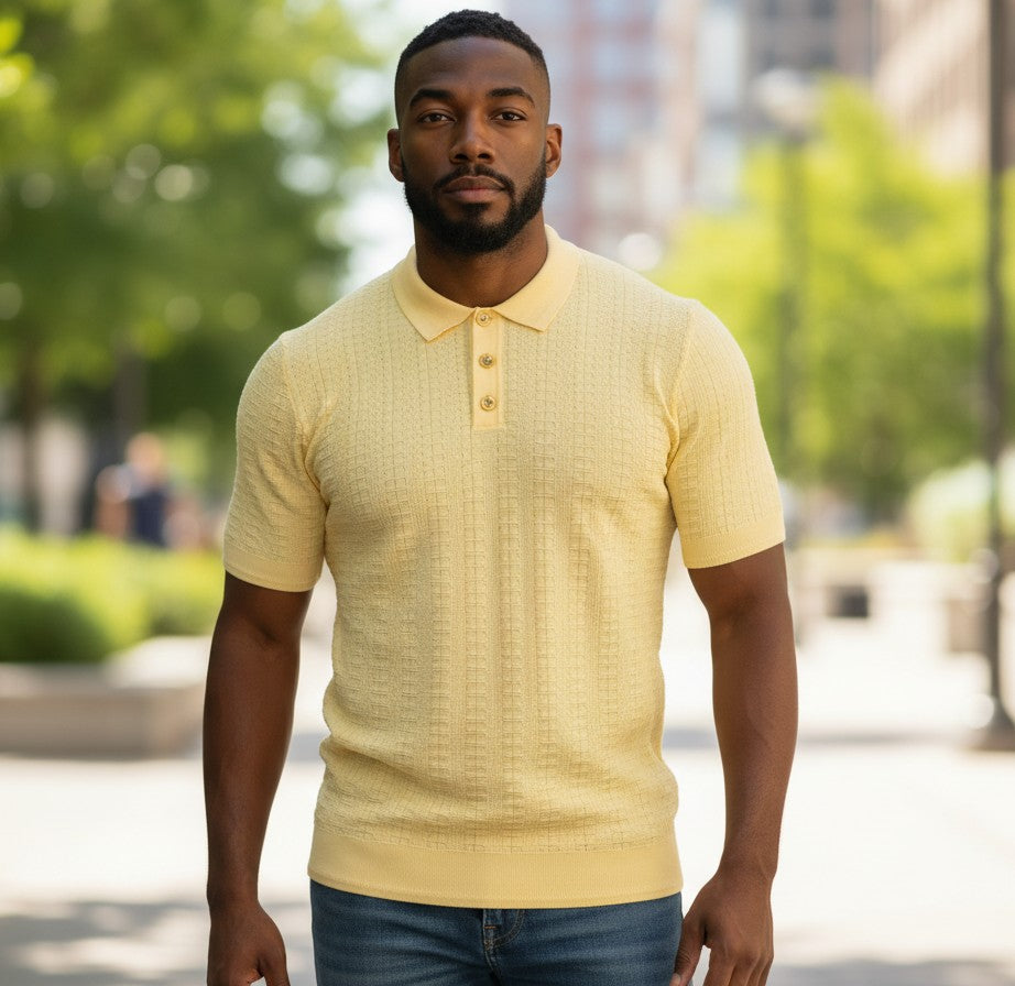 suit-yourself-menswear yellow textured knit polo shirt with a three-button placket worn by a man outdoors